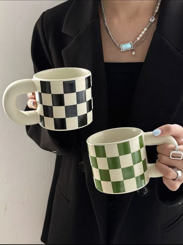 Ceramic checkered mug with rounded handle, 300ml capacity, chessboard-inspired design, dishwasher and microwave safe