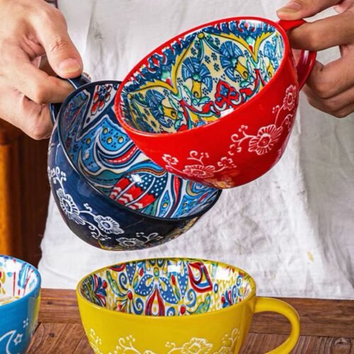 Large ceramic mug with solid color exterior, intricate floral and geometric patterned interior, dishwasher & microwave safe